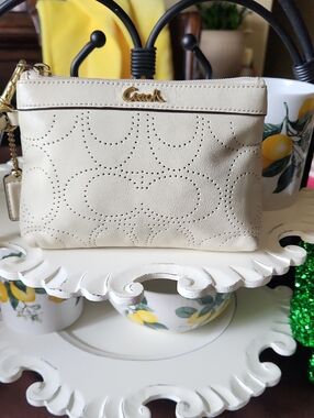 Coach Cream Perforated Leather Wristlet with Gold Logo